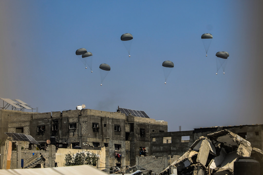 An airdrop of humanitarian aid targets northern Gaza in late July.