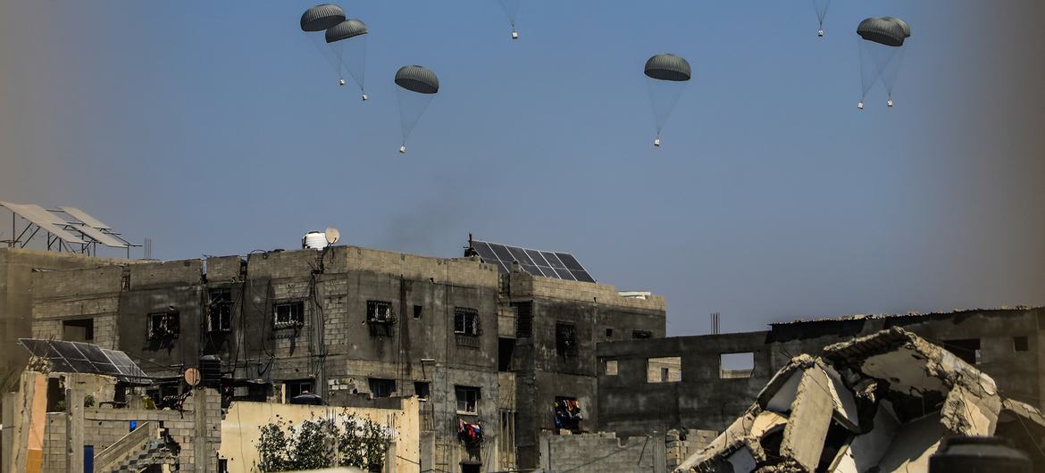 An airdrop of humanitarian aid targets northern Gaza in late July.