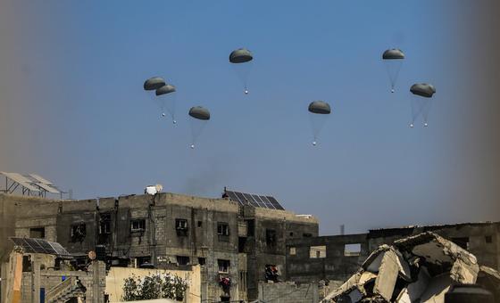 An airdrop of humanitarian aid targets northern Gaza in late July.