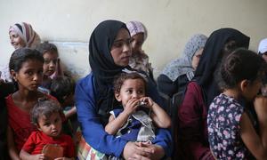 Children who are not getting enough to eat attend a nutrition clinic in Deir al Balah, in Gaza.