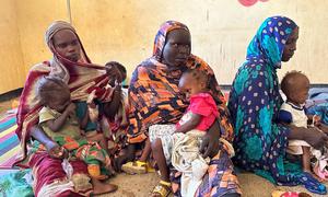 Mothers and their children attend a nutrition centre in Tawila in North Darfur State, Sudan.