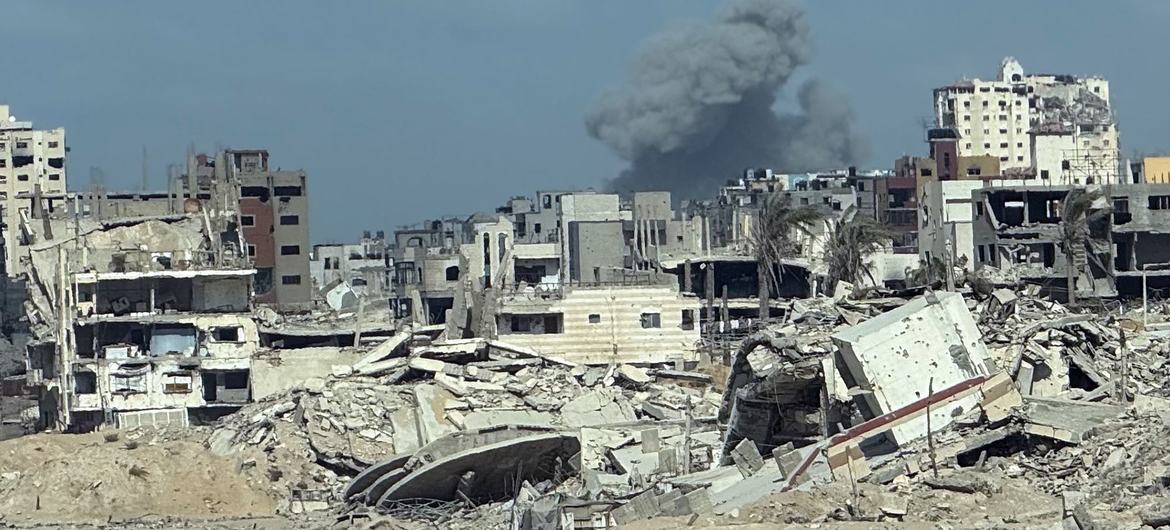 Smoke rises from a bombed building in Gaza City.