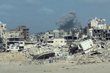 Smoke rises from a bombed building in Gaza City.