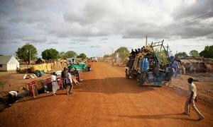 A patrol of UN peacekeepers passes through Abyei, a disputed border town between Sudan and South Sudan, where looted items are being collected after recent violence.