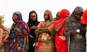 Women waiting for aid distribution in Wad Madani, Sudan.