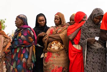 Women waiting for aid distribution in Wad Madani, Sudan.