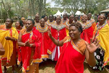 People take part in celebrations to mark the signing of declarations by councils of elders in Kenya's Samburu and Mt. Elgon regions to end the practice of female genital mutilation.