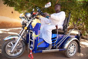 Sheij Aldine, a member of the Sudanese Association for Disabled People, rides a special motorbike provided by the organization in North Darfur, Sudan. (file)