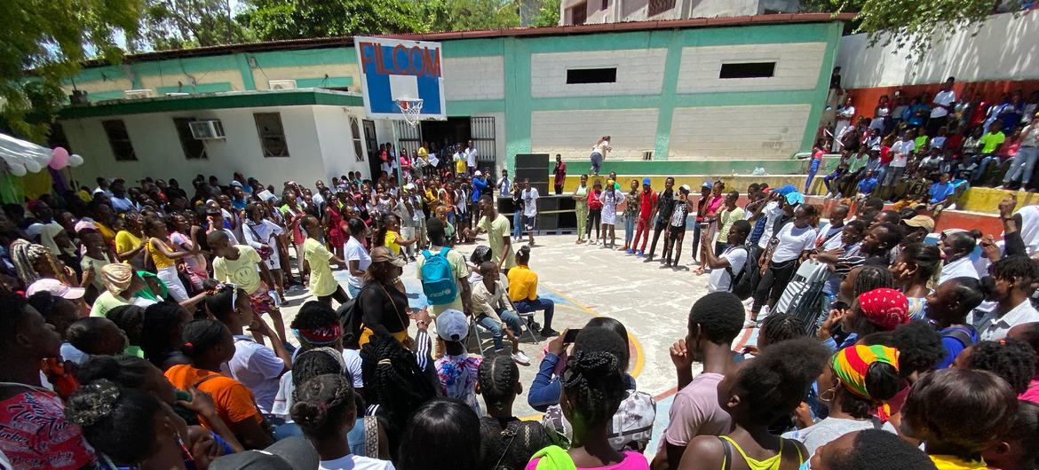 Young women and men gather at a youth event in the capital of Haiti, Port-au-Prince.