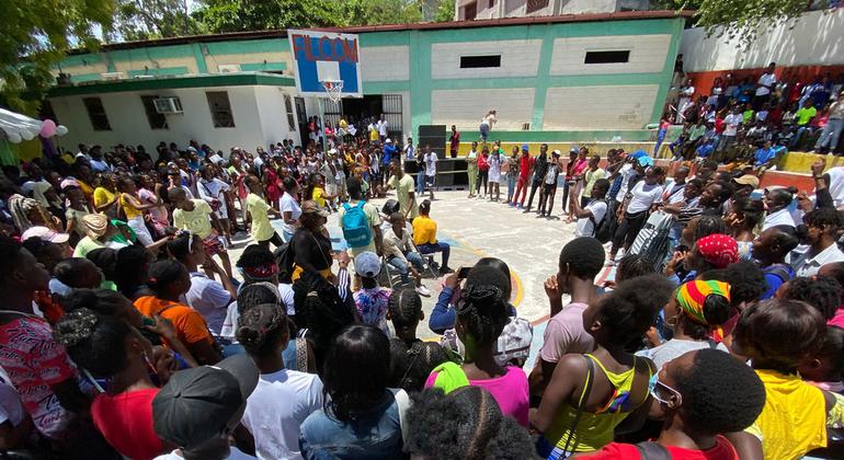 Young women and men gather at a youth event in the capital of Haiti, Port-au-Prince.