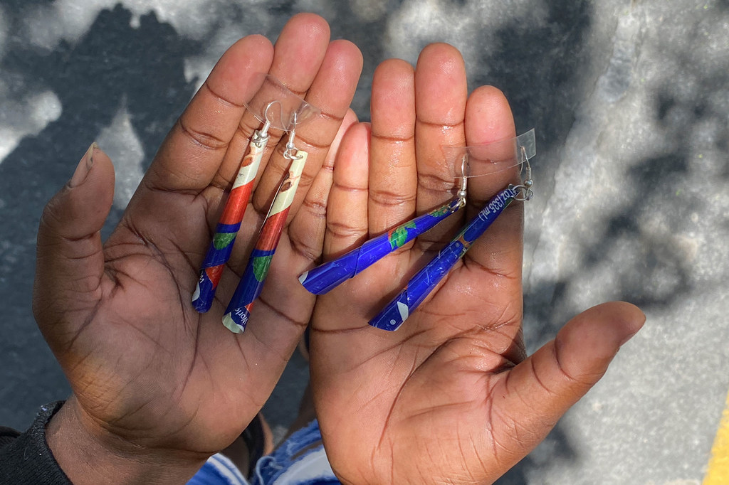 Craft products, including earrings, are exhibited at a youth event in Port-au-Prince, Haiti.