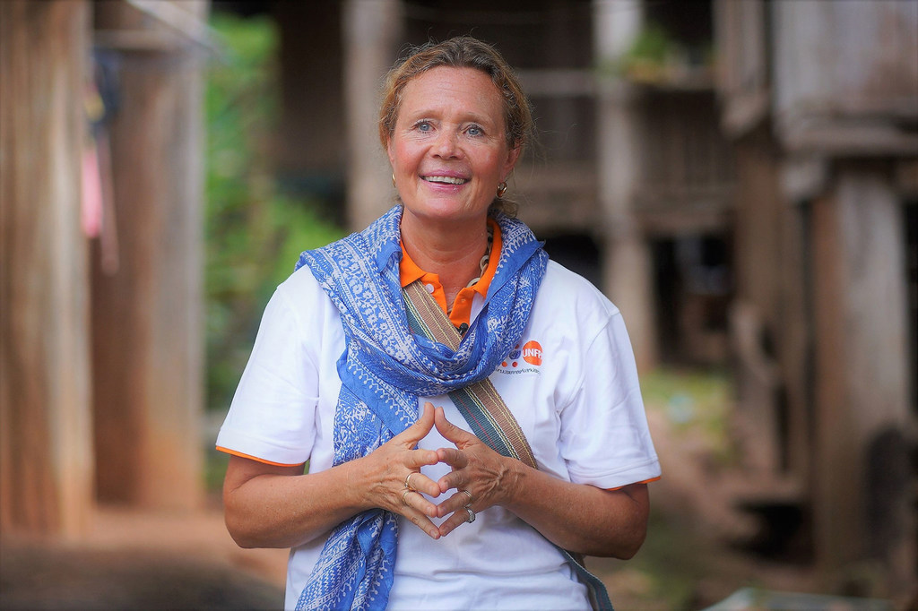 Asa Torkelsson, Country Director of UNFPA Thailand, visits a local community in a remote area of northern Thailand. 