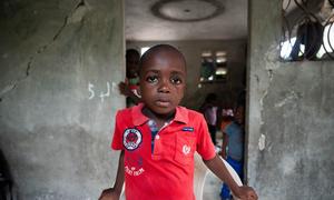 A nine-year-old young boy in Haiti is living with his mother in temporary accommodation after fleeing twice from violence.