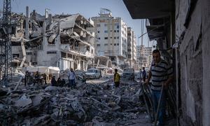 Families return to their destroyed homes in Gaza City.