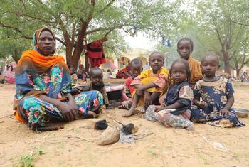 A Sudanese mother and her children displaced from their home due to the conflict. (file)