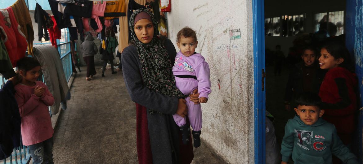 Amid displacement and bombardment, more deliveries of care for women and girls is urgently needed, according to UNRWA, which provides hygiene kits at shelters like this one.