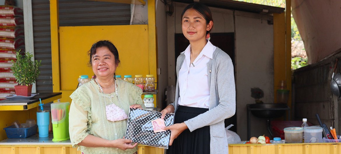 Learner Jaikham, 17, operates a Thai spicy salad food stall in Ban Nai Soi in Thailand that she opened during the pandemic.