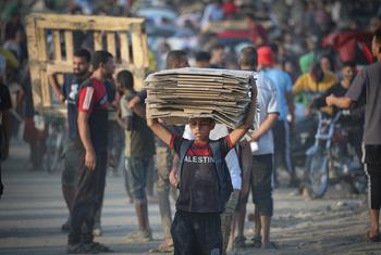 A boy walks through Netzarim in the Gaza Strip.
