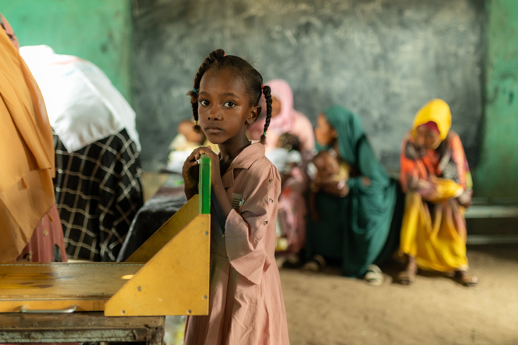 Children receive health and nutrition services at a UNICEF-supported centre in Umshouka, Sudan.