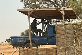 A Nigerien soldier guards a strategic location in Ouallam, Niger.