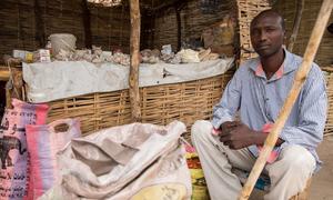 A man sells produce in Birao in the Central African Republic to where thousands of refugees from Sudan have moved.