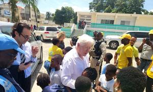 Bob Rae, Canada's Ambassador to the UN and President of the UN's Economic and Social Council meets young Haitians in Port-au-Prince.