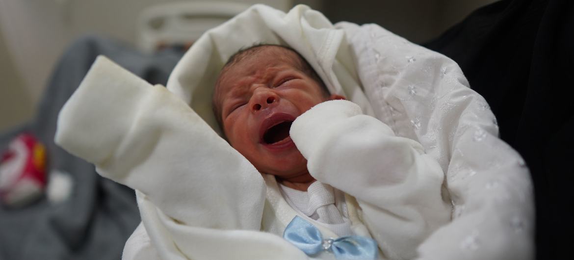 A newborn is delivered at the Al Shifa hospital in Gaza.