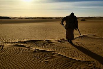 Migrants often cross the Libyan desert to reach smuggling routes across the Mediterranean Sea.