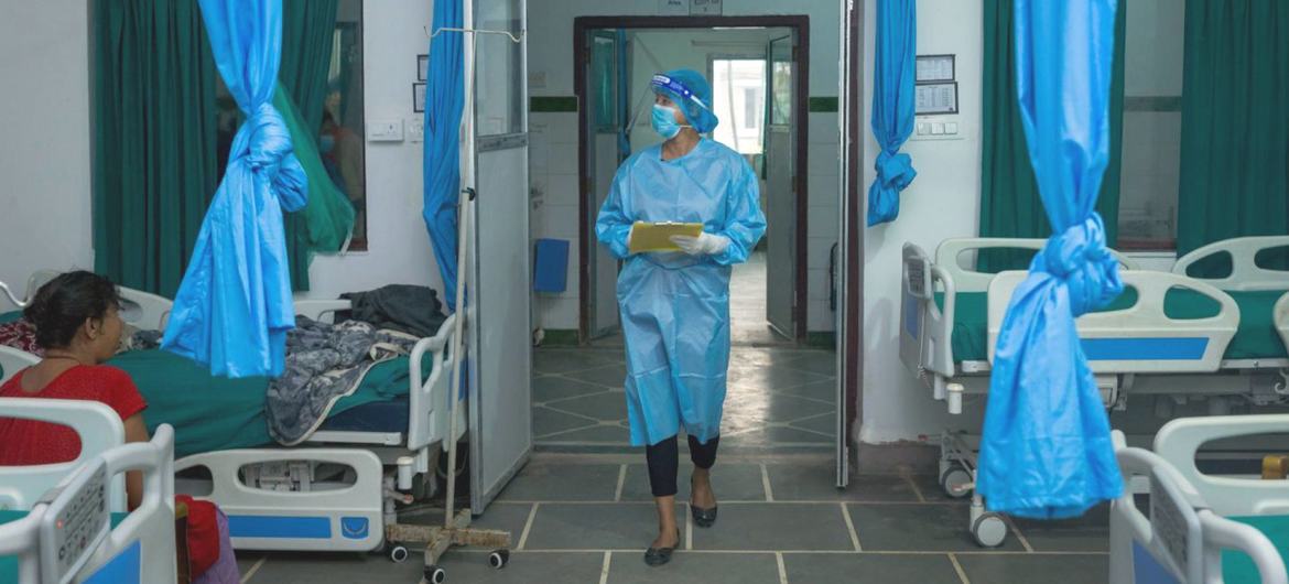 A nurse walks into a hospital ward in Janakpur in Dhanusha District in southern Nepal.