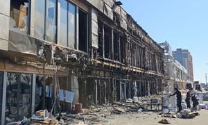 A bombed shopping centre lies in ruins in Odesa.