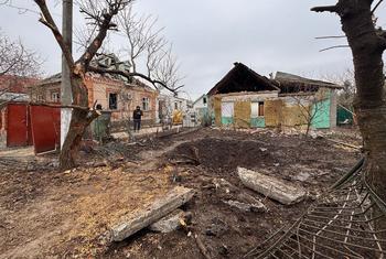 A rural area in Ukraine shows the signs of bomb damage.