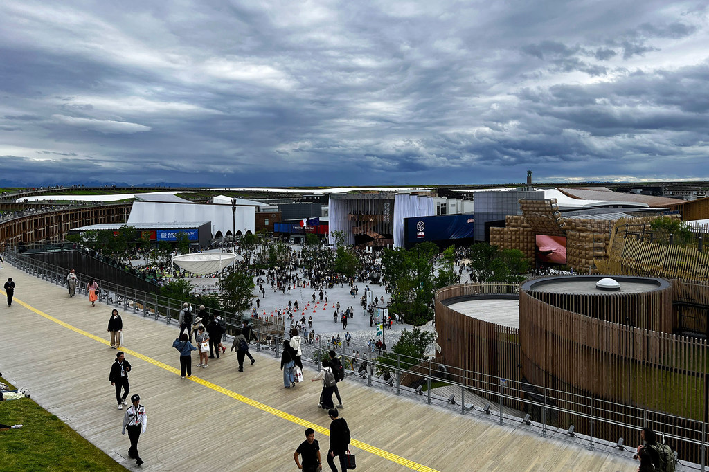 Visitors to Expo 2025 in Osaka, Japan, walk around the grand ring which circles the event space.