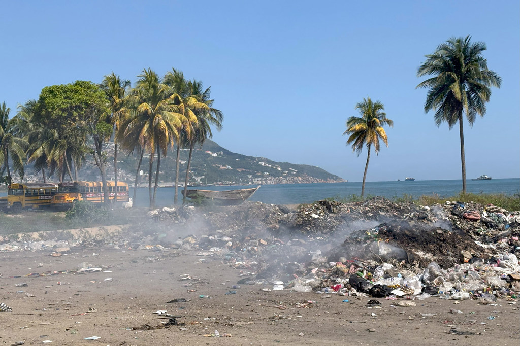 Rubbish burns on the coast of Haiti. Rubbish burns on the coast of Haiti.