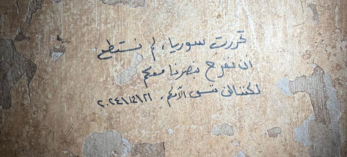 A message on the walls of Sednaya prison reads: 'Syria is free; we couldn't celebrate our victory with you, but we will not forget your pain.' A message on the walls of Sednaya prison reads: 'Syria is free; we couldn't celebrate our victory with you, but we will not forget your pain.'