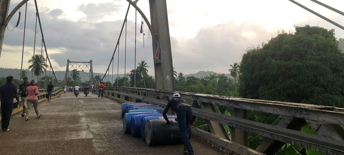 The bridge into Jérémie is closed to vehicles after it was damaged in the earthquake.