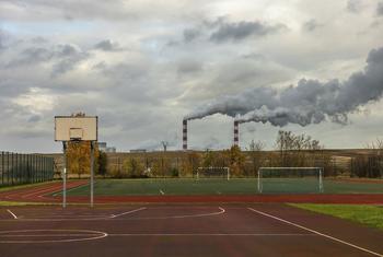 A school playground in the Belchatow neighbourhood of Kleszczow, Poland, near a coal-fired power plant. (file)