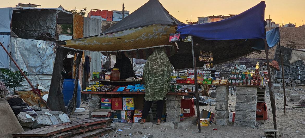 A makeshift store in Gaza, where ongoing Israeli bombardment has damaged or destroyed 170,812 structures - or 69 per cent of the total - according to UNOSAT analysis.