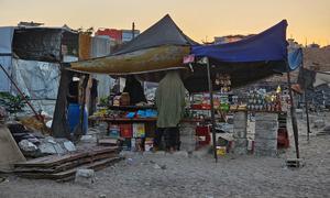 A makeshift store in Gaza, where ongoing Israeli bombardment has damaged or destroyed 170,812 structures - or 69 per cent of the total - according to UNOSAT analysis.