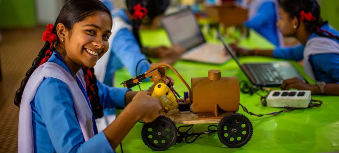 Students in Chhattisgarh, India, attend a robotics class.