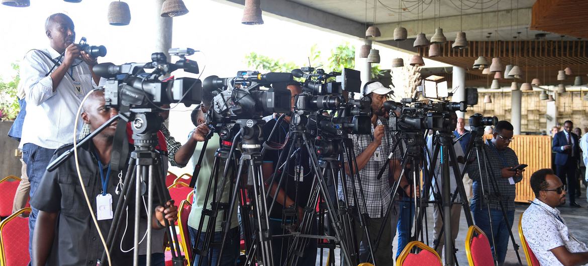 Journalists in Somalia attend a press conference.