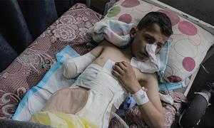 Un niño recibe atención médica tras quedar atrapado en un ataque con misiles en Gaza (mayo de 2025).