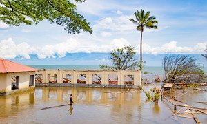 A man wades through what is left of Bujumbura’s nautical centre.