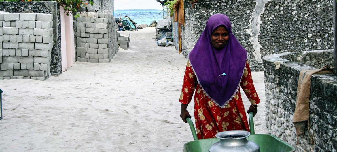 Water shortages exacerbated by clime  alteration  are affecting the Maldives' low-lying islands.