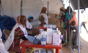 A UNICEF-supported mobile clinic provides healthcare to people displaced by violence in Darfur, Sudan.