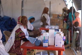 A UNICEF-supported mobile clinic provides healthcare to people displaced by violence in Darfur, Sudan.