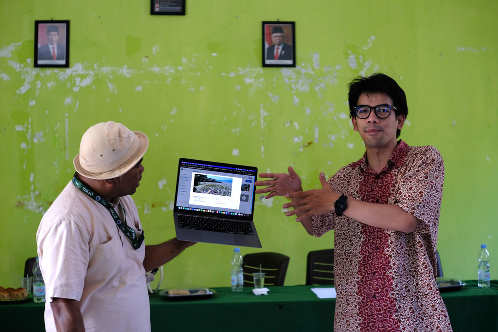 Village leaders in Indonesia testing STRIVE, a UNDP-backed AI tool