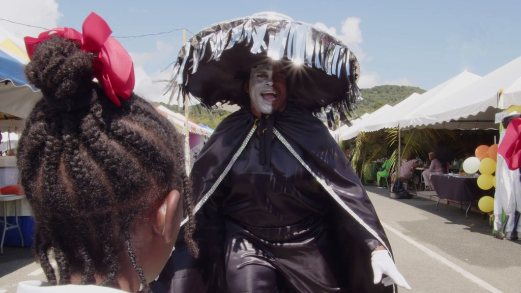 Ang mga carnival performer ng Caribbean ay humaharap sa entablado upang labanan ang disinformation sa COVID