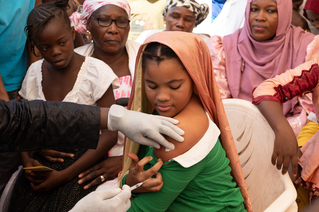 A young woman in Bamako, Mali, receives a vaccination for HPV, the main cause of cervical cancer.