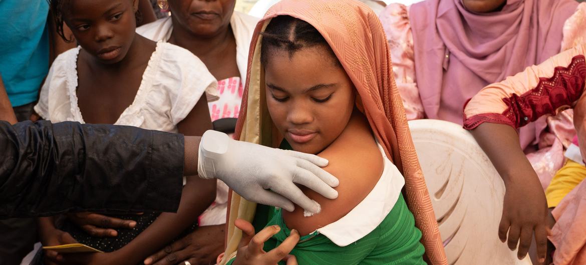 A young woman in Bamako, Mali, receives a vaccination for HPV, the main cause of cervical cancer.