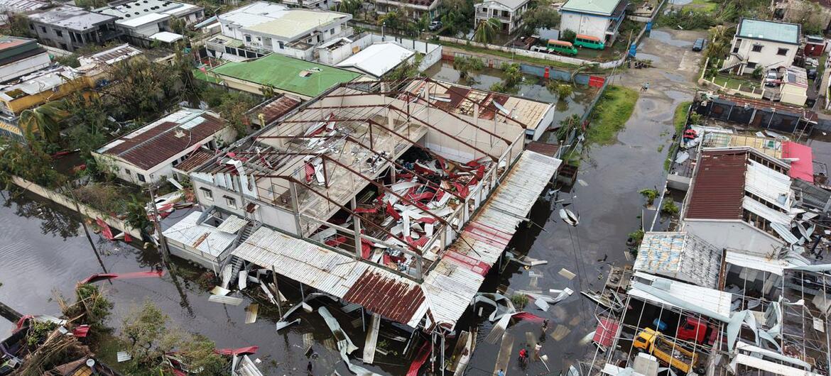 An aerial view of severe damage caused by Cyclone Gezani in Toamasina, Madagascar, showing destroyed buildings, flooded streets, and disrupted infrastructure following the cyclone's landfall.